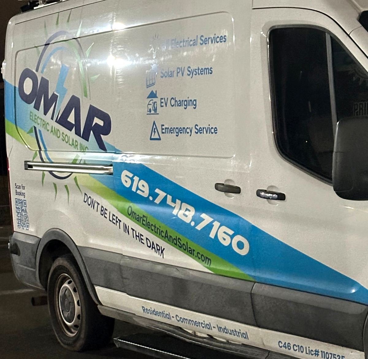 White Omar Electric and Solar work van with a blue and green stripe, the phone number 619.748.7160, and the services All Electrical Services, Solar PV Systems, EV Charging and Emergency Service.